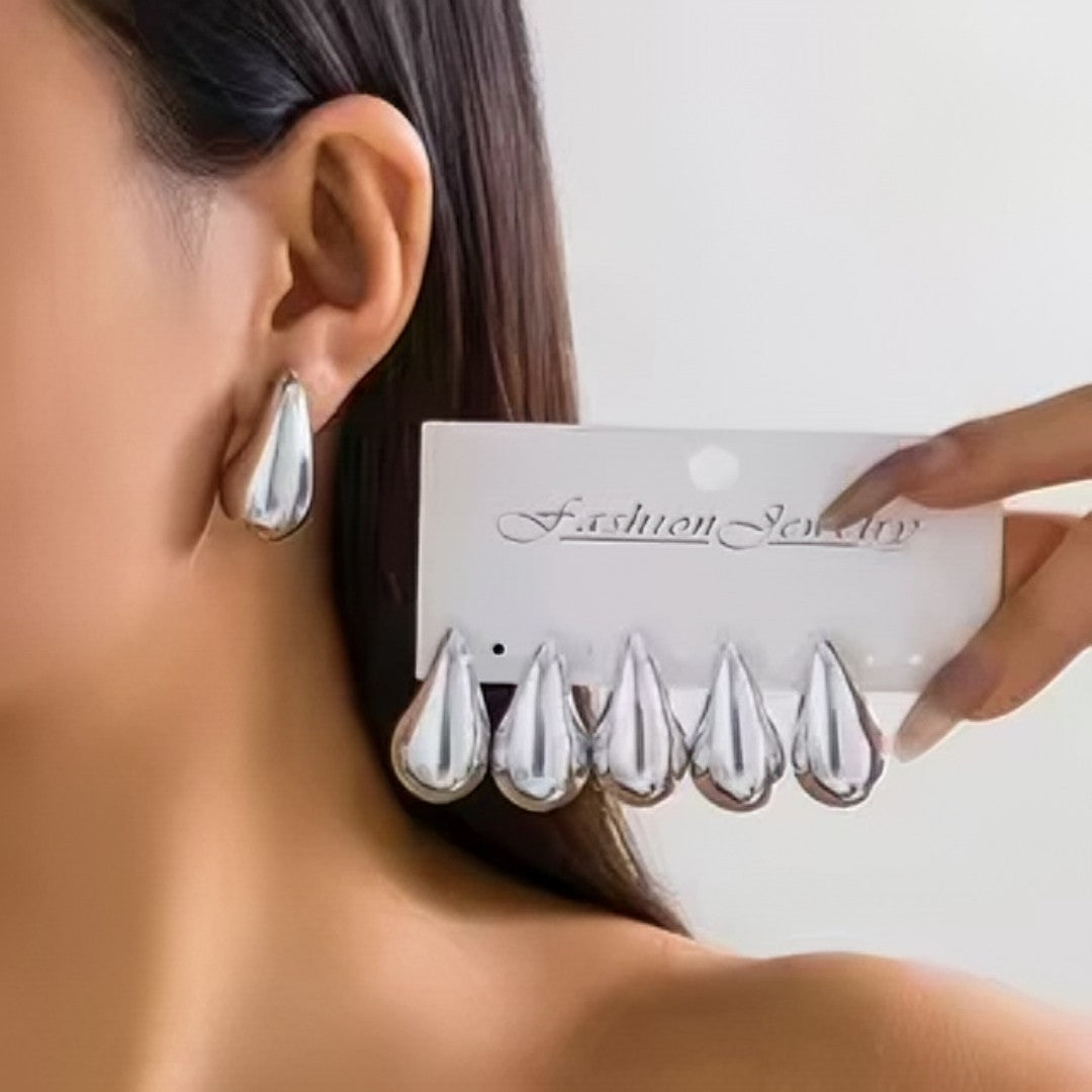 š EleganceDrop⢠ā Brincos de Gota Bold Banhados a Ouro 18K e Prata com Brilho Intenso e Design Sofisticado
