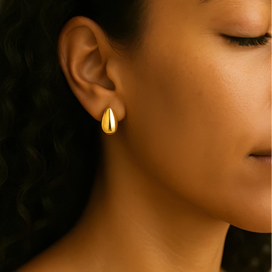 š EleganceDrop⢠ā Brincos de Gota Bold Banhados a Ouro 18K e Prata com Brilho Intenso e Design Sofisticado