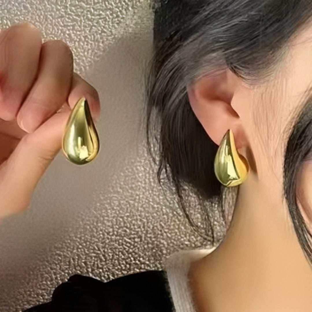 👉 EleganceDrop™ – Brincos de Gota Bold Banhados a Ouro 18K e Prata com Brilho Intenso e Design Sofisticado